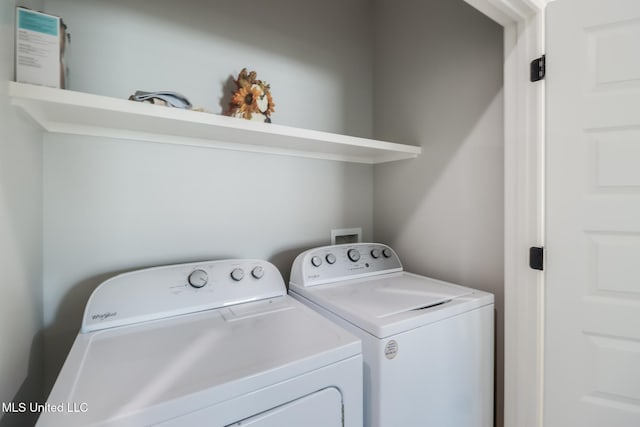 laundry area with laundry area and washing machine and dryer