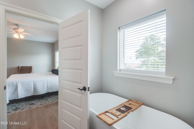 bedroom featuring wood finished floors
