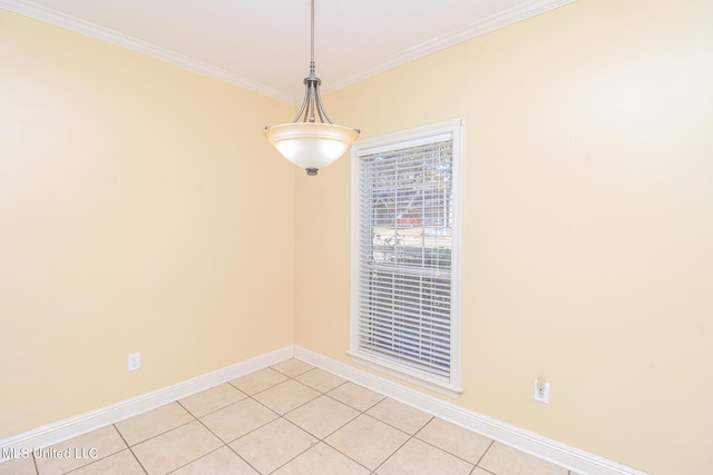 tiled empty room with crown molding