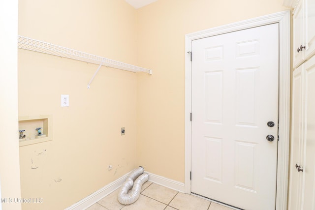 laundry room featuring hookup for a washing machine, light tile patterned flooring, and hookup for an electric dryer