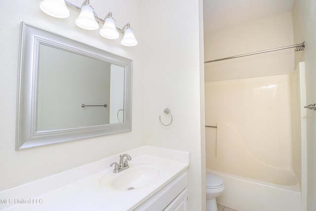 full bathroom with tile patterned floors, toilet, vanity, and tub / shower combination