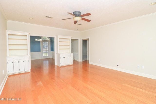 unfurnished bedroom featuring crown molding and light hardwood / wood-style floors