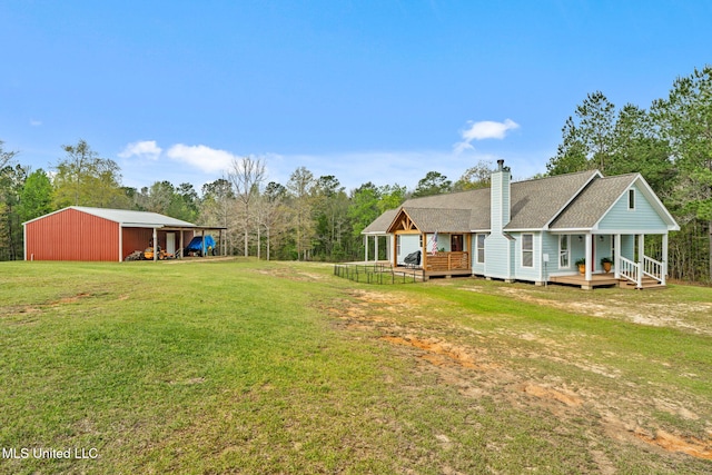 view of yard with covered porch