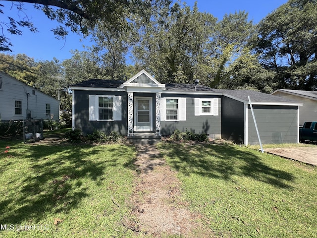 802 Farmer St, Cleveland, MS 38732 - view of front of house with a front lawn and a shingled roof