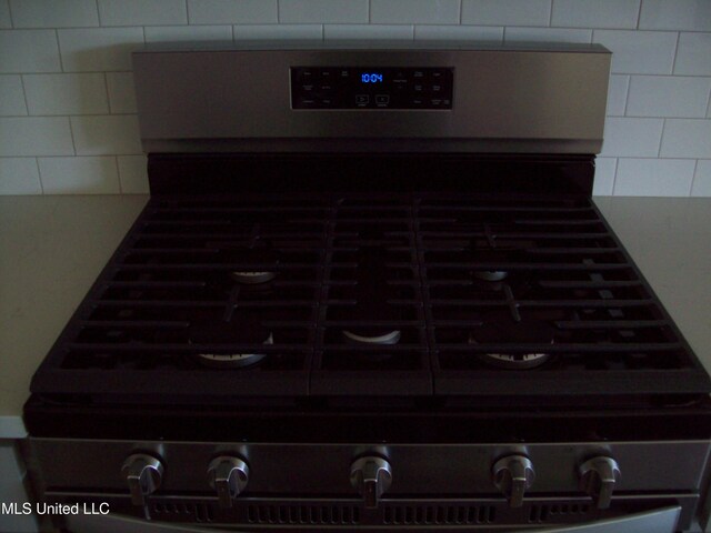 room details with stainless steel range oven