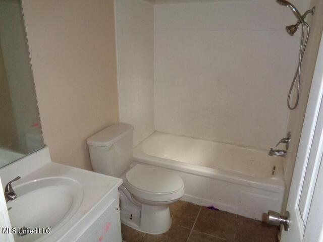 6301 Pioneer Trl, Moss Point, MS 39562 - bathroom with vanity, shower / bath combination, and tile patterned floors