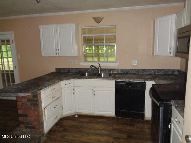 6301 Pioneer Trl, Moss Point, MS 39562 - kitchen with dishwasher, range, dark wood-style flooring, a peninsula, and ornamental molding