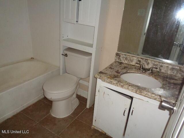 6301 Pioneer Trl, Moss Point, MS 39562 - full bath featuring vanity and tile patterned floors