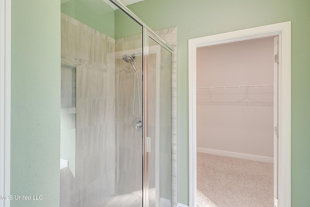 bathroom featuring walk in shower