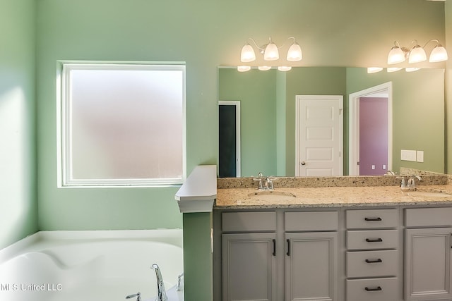 bathroom featuring a bathtub and vanity