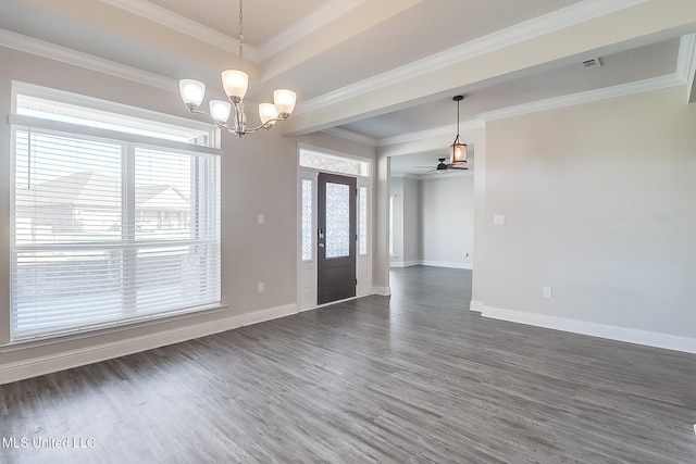 entrance foyer with ornamental molding, dark wood-type flooring, and ceiling fan with notable chandelier