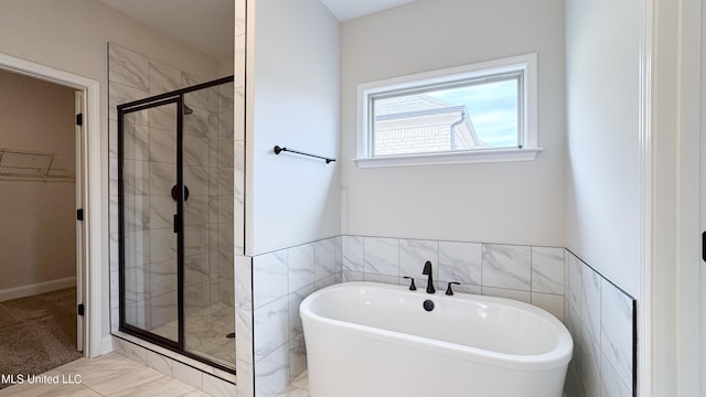 bathroom with independent shower and bath