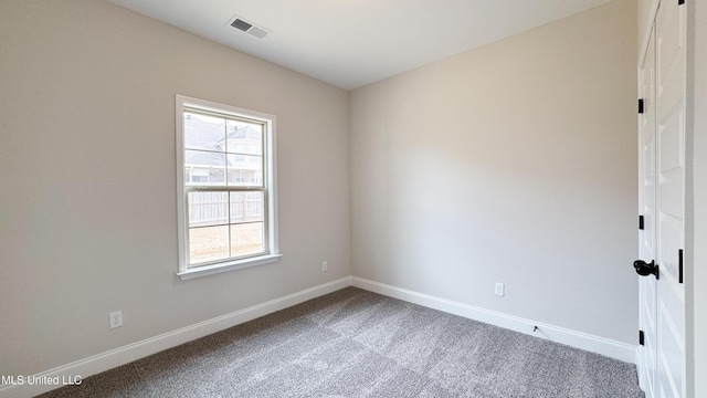 unfurnished room with carpet floors