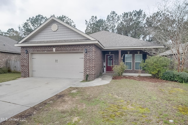 view of front facade with a front yard and a garage