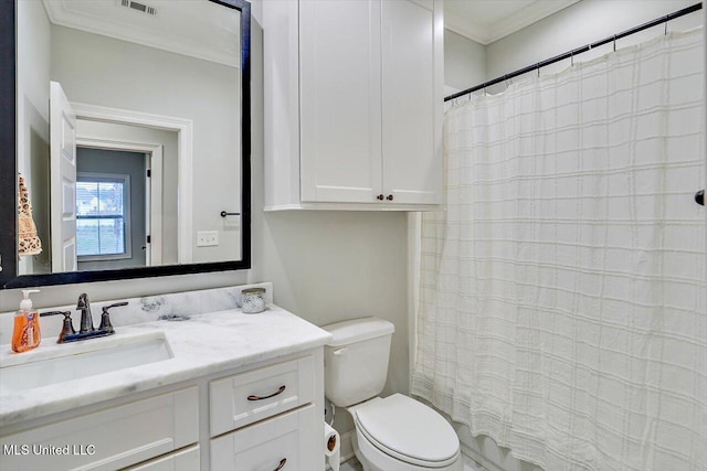 bathroom with crown molding, vanity, a shower with shower curtain, and toilet