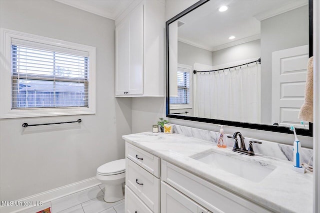 bathroom featuring tile patterned floors, crown molding, vanity, and toilet