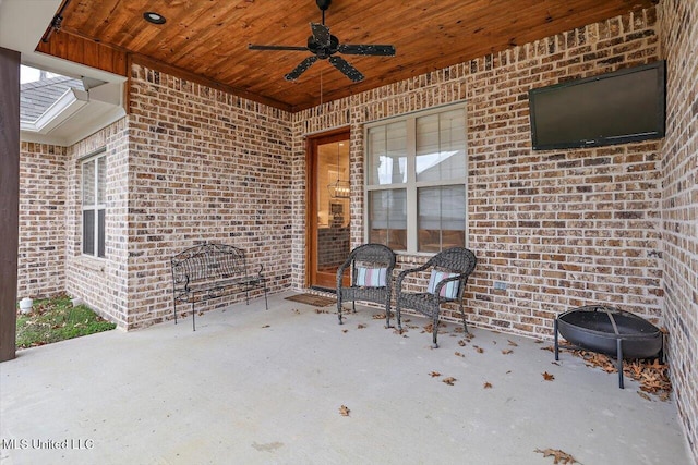 view of patio featuring ceiling fan