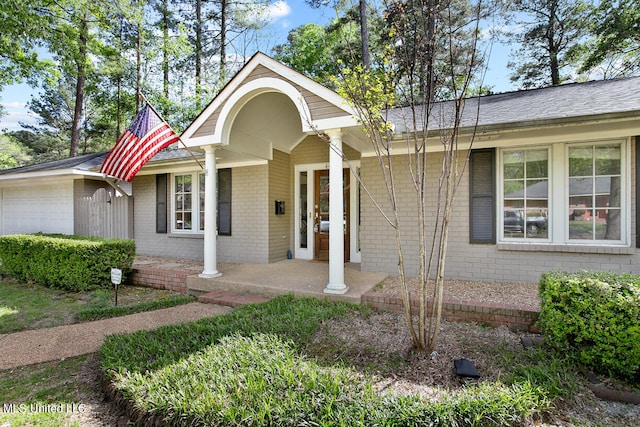 ranch-style home with covered porch