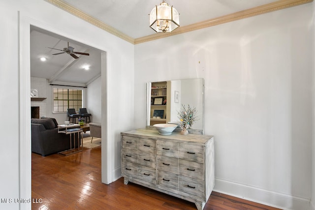 hallway featuring ornamental molding and dark hardwood / wood-style floors