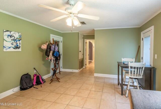 211 Traceway Dr, Natchez, MS 39120 - interior space with crown molding, light tile patterned flooring, a textured ceiling, ceiling fan, and arched walkways