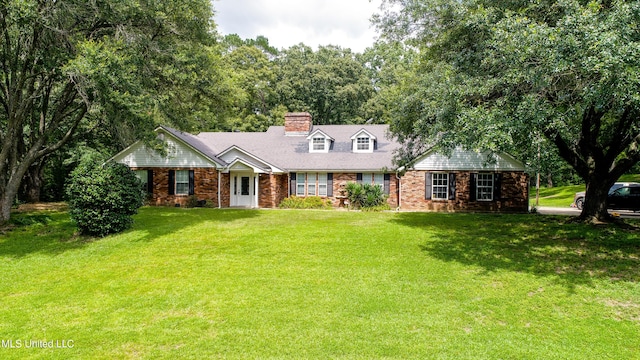 211 Traceway Dr, Natchez, MS 39120 - view of front of property with brick siding, a chimney, and a front lawn