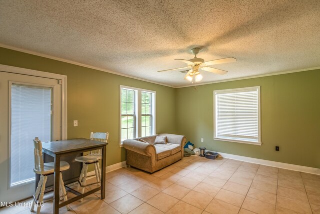 211 Traceway Dr, Natchez, MS 39120 - sitting room featuring ornamental molding, a ceiling fan, a textured ceiling, and light tile patterned flooring