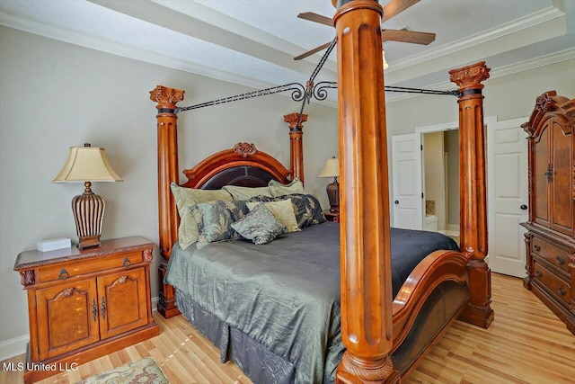 bedroom with light hardwood / wood-style floors, ceiling fan, and ornamental molding