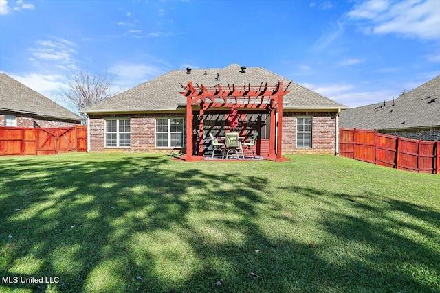 rear view of property with a lawn, a pergola, and a patio