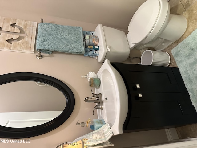 bathroom featuring toilet