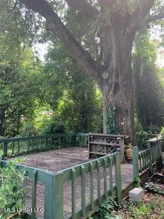 1030 Adkins Blvd, Jackson, MS 39211 - view of yard with a wooden deck