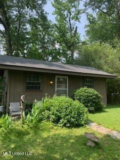 1030 Adkins Blvd, Jackson, MS 39211 - view of front of home with a front yard