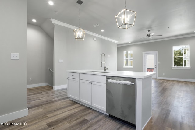 kitchen featuring dishwasher, a sink, ornamental molding, recessed lighting, and a chandelier