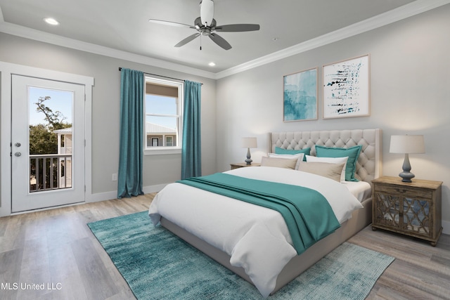 bedroom featuring access to exterior, wood finished floors, crown molding, recessed lighting, and baseboards