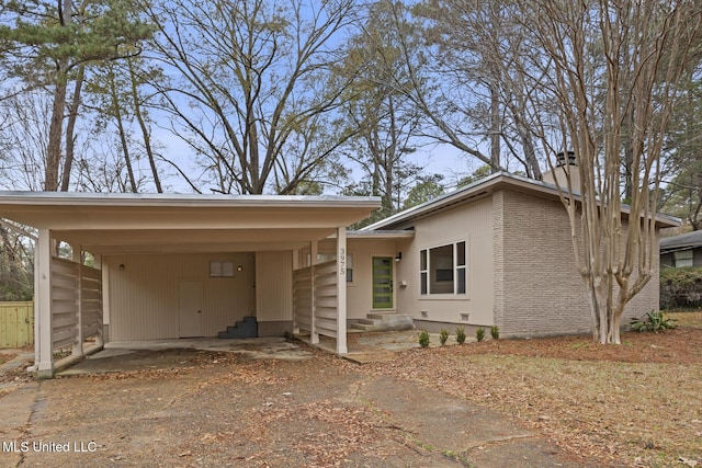 view of front of house featuring a carport