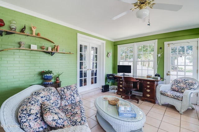 sunroom / solarium featuring french doors