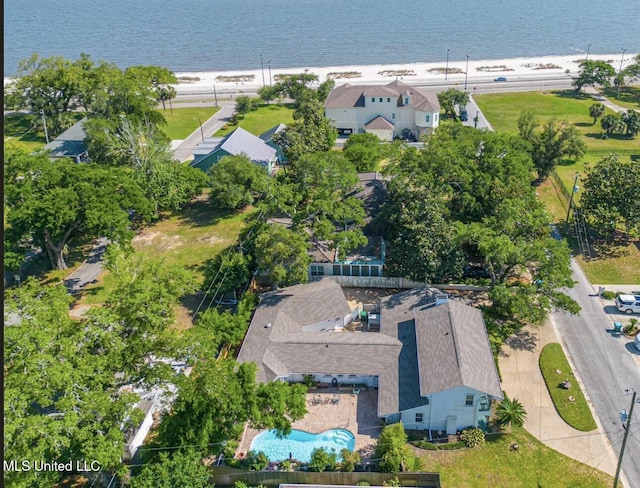 drone / aerial view with a water view