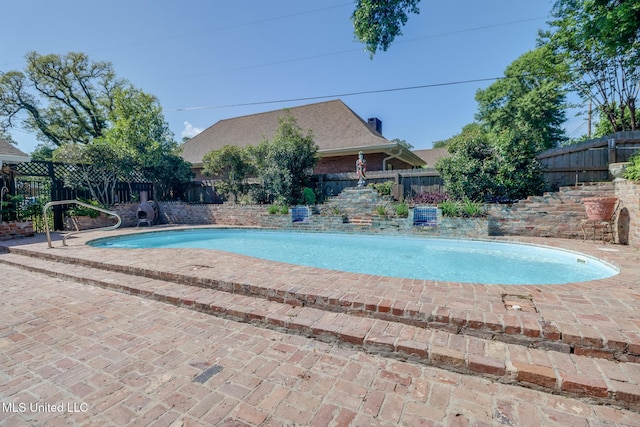 view of pool with a fenced backyard and a fenced in pool