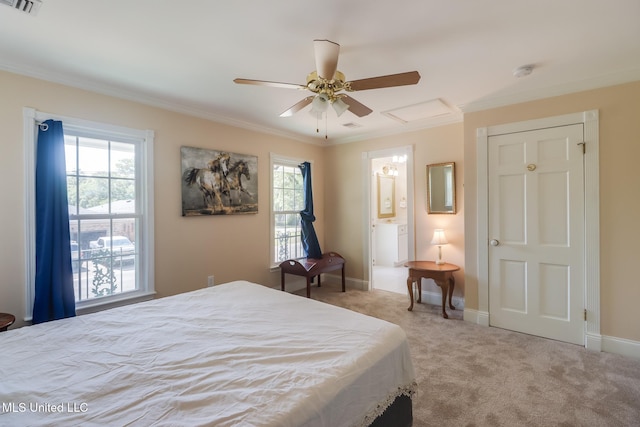 bedroom featuring ornamental molding, carpet, ensuite bathroom, and multiple windows
