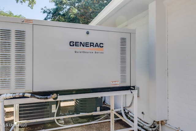 exterior details featuring a power unit and concrete block siding
