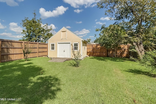 view of outbuilding with a lawn