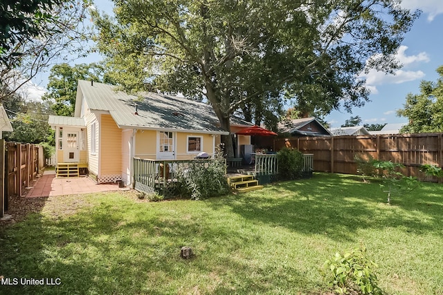 view of yard with a deck