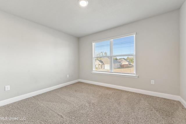 empty room with carpet floors