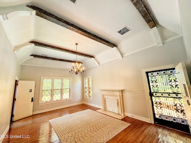 5228 Old Hwy 49, Clarksdale, MS 38614 - foyer with a chandelier, wood finished floors, baseboards, and a high end fireplace