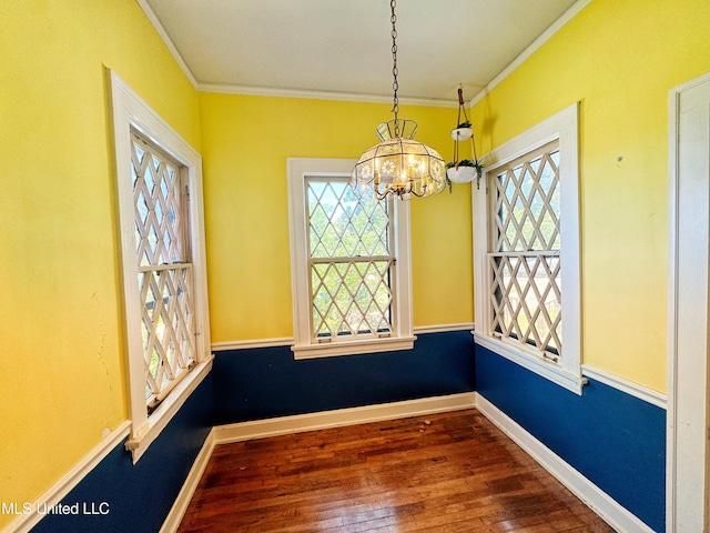 5228 Old Hwy 49, Clarksdale, MS 38614 - unfurnished dining area featuring ornamental molding, a chandelier, wood finished floors, and baseboards