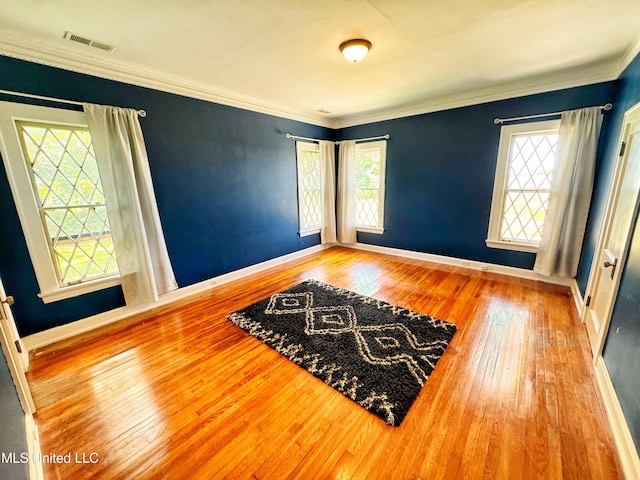 5228 Old Hwy 49, Clarksdale, MS 38614 - empty room featuring hardwood / wood-style floors, plenty of natural light, baseboards, and ornamental molding