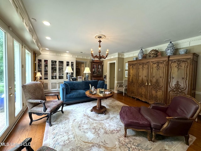 59 Dunbar Rd, Natchez, MS 39120 - living area with a chandelier, ornamental molding, wood finished floors, and french doors