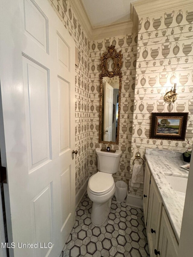 59 Dunbar Rd, Natchez, MS 39120 - half bath with toilet, tile patterned floors, vanity, and crown molding