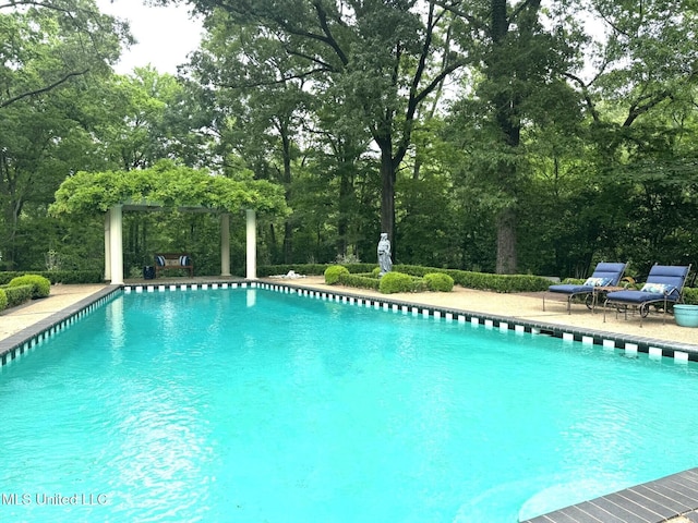 59 Dunbar Rd, Natchez, MS 39120 - swimming pool featuring a gazebo and view of wooded area