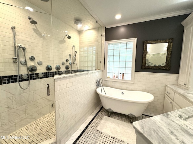 59 Dunbar Rd, Natchez, MS 39120 - full bath with a stall shower, vanity, a freestanding tub, tile walls, and ornamental molding