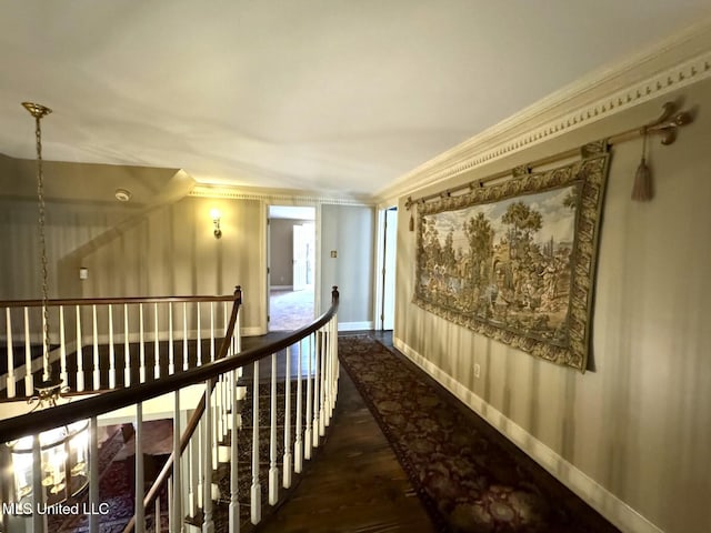 59 Dunbar Rd, Natchez, MS 39120 - hall featuring wood finished floors, an upstairs landing, ornamental molding, and baseboards